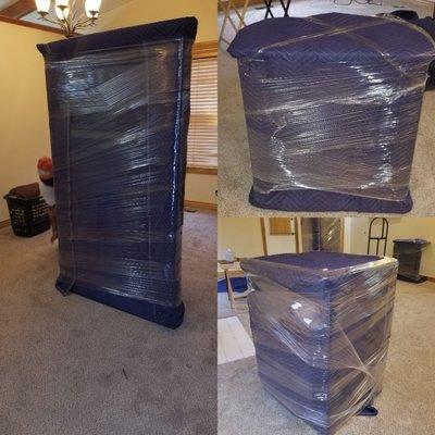 A tall corner entertainment stand, a end table and bottom right is a washer