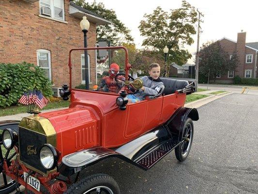 Kids in one of the DHM's two Model Ts during the annual Halloween Party.