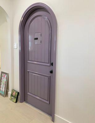 Amazing work from Blue Dog Contracting - gorgeous door, drywall, perfect lavender paint, and flooring.