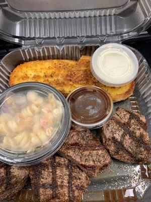 Bistro Tender (cooked medium) pasta salad and warm garlic bread. A-1 sauce and ranch (Ordered 2Go)