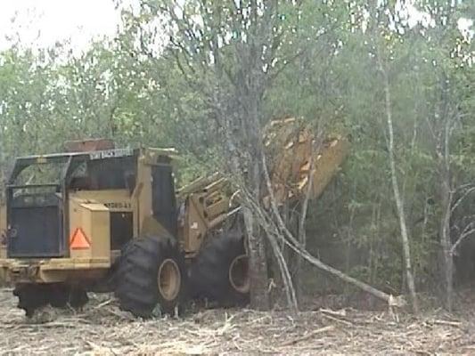 A hydro ax can clear land that you cannot even walk through