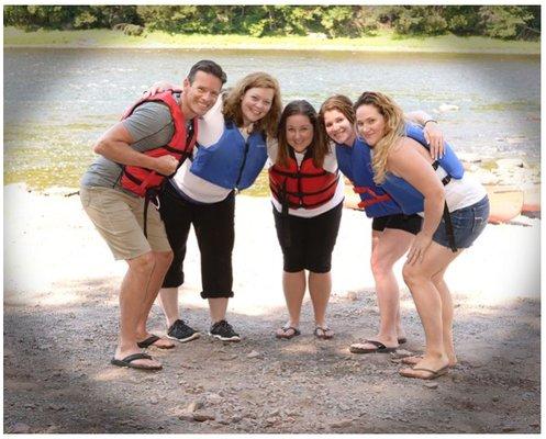 The CONRAD PROTECTION TEAM on a company bonding rafting trip.