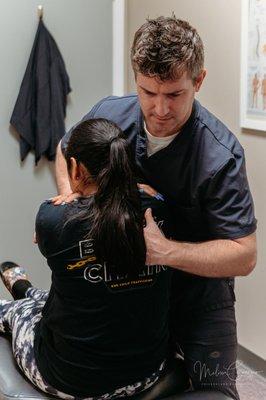 Dr. Paul McCarthy adjusting a patient