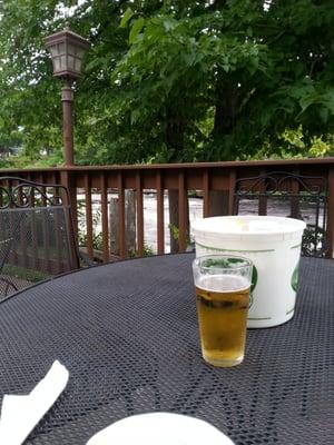 Table on the patio with the waterfalls sounds in the background