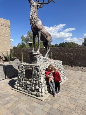 Kiddos out front with the lodge Elk