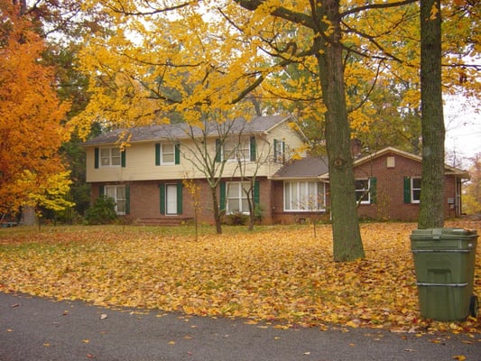 We pressure washed entire house and prepped and painted vinyl siding with a lighter color to avoid warping of the siding.