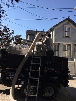 Attic insulation removal in Petaluma