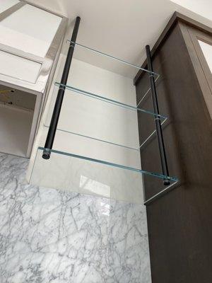 Floating glass shelves
-Black anodized hardware
- 1/2 Low iron tempered