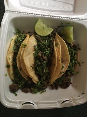 Three steak tacos with cilantro (no onions or pickles)