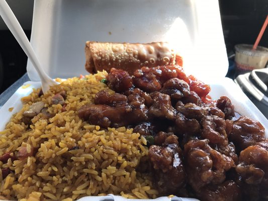 General Gso Chicken lunch special.  Fork for size reference, crazy amount of food.