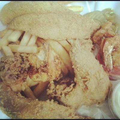 Whole wings, catfish, and fried shrimp w bread, coleslaw, pickles, peppers, and fries!