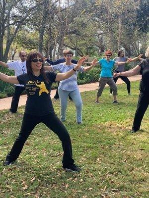 Tai Chi Class, doing 'Single Whip' move... led by Instructor Suzanne Chen