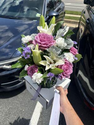 Beautiful purple flowers arranged by Royalty Flowers.