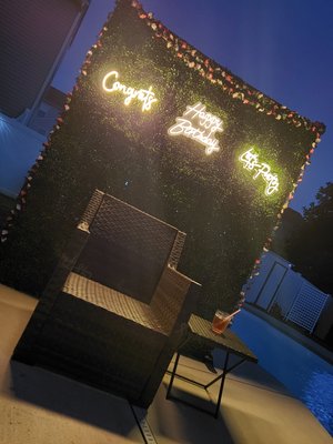 Faux Flower wall backdrop with LED sign