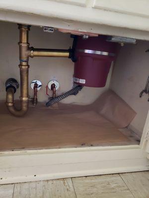 New garbage disposal & plumbing fixtures