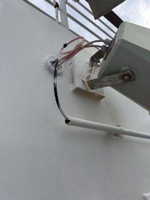 Exposed wiring and paint over everything