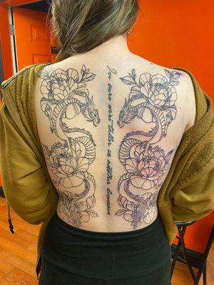 black and grey symmetrical dragons and floral back piece