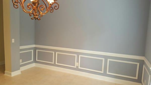 Painted walls and chair rail and boxes