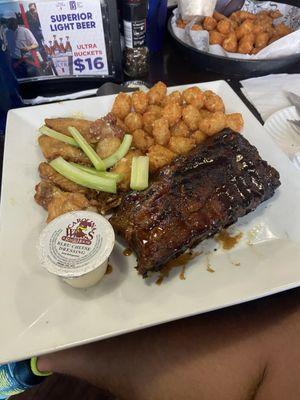 BBQ Ribs (half rack) and wing combo with tots.