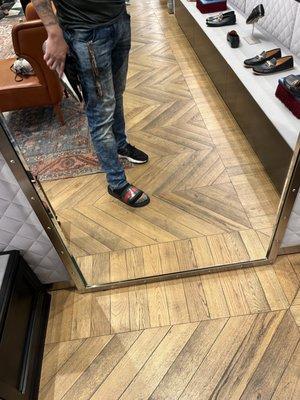 Haha. Trying on the Gucci Slides