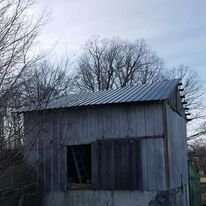 Old barn with a new metal roof.