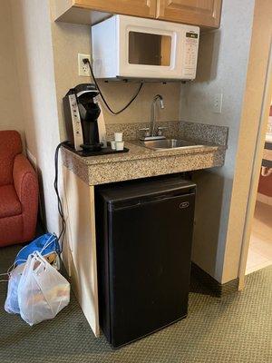 Keurig machine, sink, mini fridge and microwave was nice