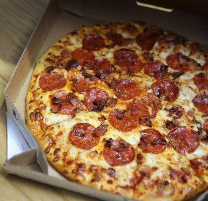 Pepperoni & Bacon pizza, cooked to perfection.