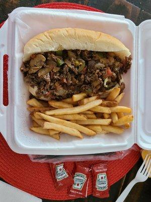 Steak sandwich and fries