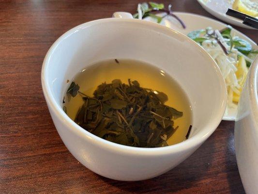 Their tea is served as a soup. Your only option is to enjoy it as if drinking out of a storm drain after a hard downpour.