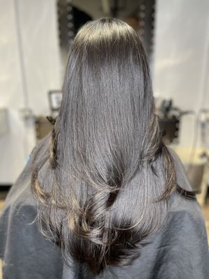 haircut to give long layers and blowout