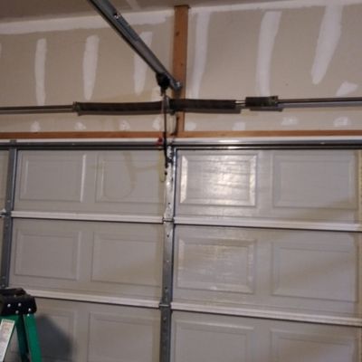 Broken spring replaced on 16x7 garage door