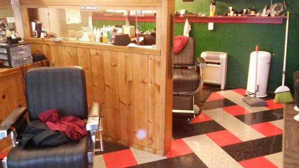 A nice clean shop with a barber shop family friendly atmosphere