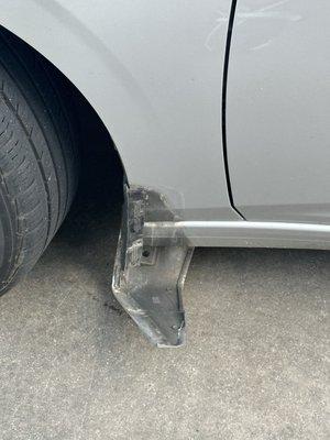 The splash guard that was ripped off my car when I was told to pull in and it began to scrape.