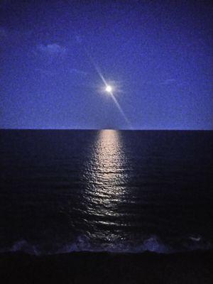 Rising moon viewed from balcony