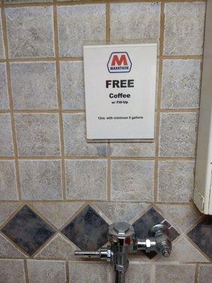 As seen in the Men's Room. Free coffee with fill up.