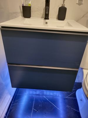 Custom floating cabinet sink with LED