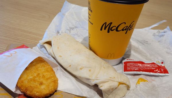 Sausage burrito, hash brown, coffee