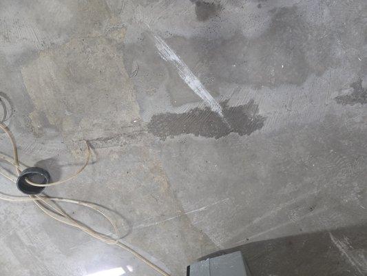 Original cracks after concrete leveling and hydro seal. Still wetness.