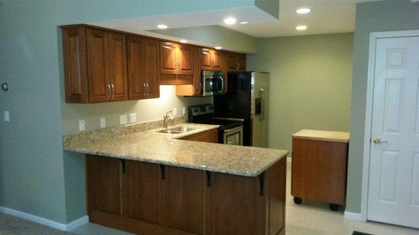 Kitchen remodel done with new custom cabinets and cabinet refacing