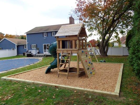 Installation of edging and playground mulch