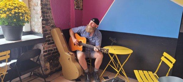 Picked up a spare guitar and played a few songs for the staff and patrons.