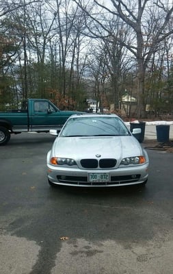 Fresh wash on the bmw, being prepped for a clay bar treatment. Ford in background just had a full rim polishing