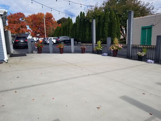 Outdoor patio space in warm weather. Plenty if parking behind the building.