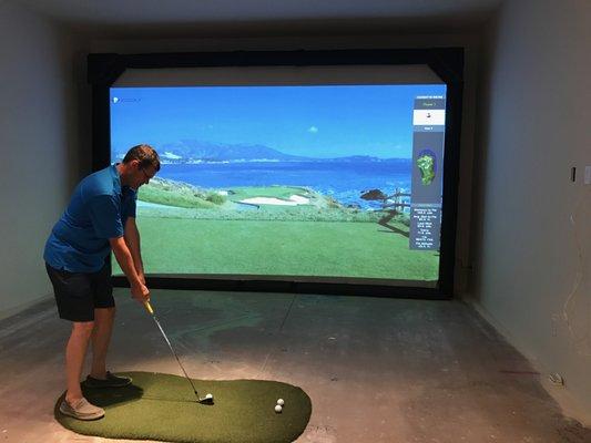 Testing an HD-Golf simulator before turf and curtains went up, Fountain Valley AZ