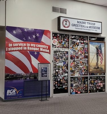 This awesome store front really shows so much military support.....  look at all of those military stickers all over!