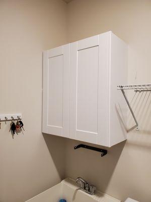 Installed cabinet in laundry room