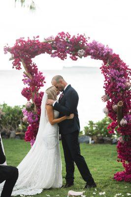 Stunning Blush and Fuchsia Driftwood Arch by Petals