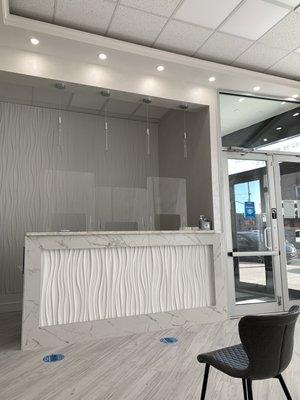 Their new offices are state of the art, social distanced, absolutely spotless!!!! This is Front desk.