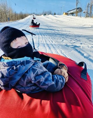 The nephews think sledding is snow much fun!