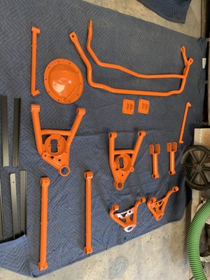 Auto parts:  Sandblasted, primed & powder coated